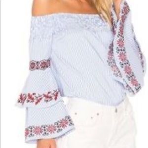 Off the shoulder shirt with embroidered sleeve